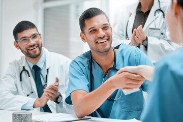 Hospital, clapping or doctors shaking hands for interview, good job or promotion success in...