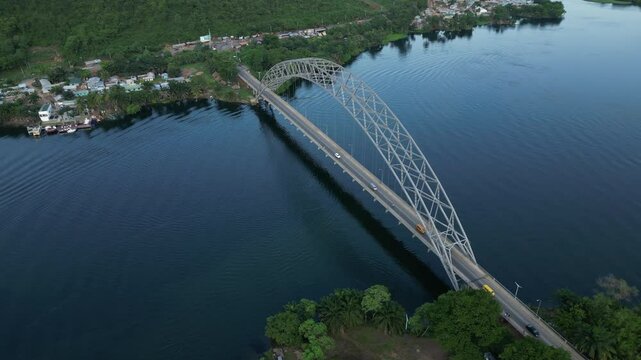 Drone shot of Boat cruise under the Adomi Bridge in Akosombo, Ghana