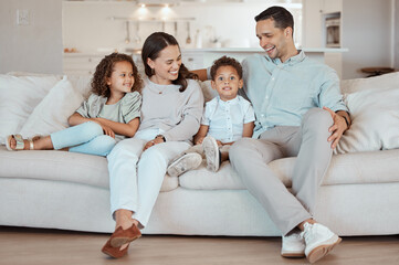 Fototapeta premium Kids, happy family and portrait of parents laughing in home together for care, love and bonding. Smile, mother and father with funny children on sofa in lounge for joke, story and relax with siblings