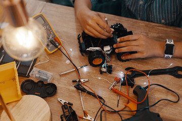 Child, hands and car robotics for education with machine learning, developing and study of electronic transport. Boy, vehicle and creative engineering for stem toys, circuit building and house tools