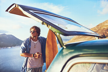 Outdoor, man and travel with car, road trip and ready for adventure, tourism and surfboard for...