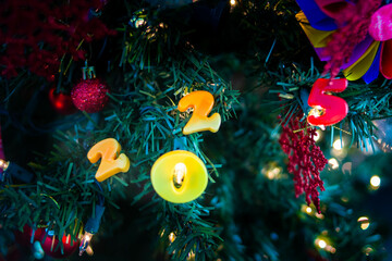 Christmas tree with lights and numbers 2025 New Year's Eve