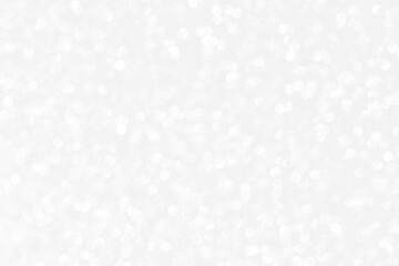 White and gray bokeh background. The concepts of New Year, Christmas, Wedding, Anniversary and celebrations.	
