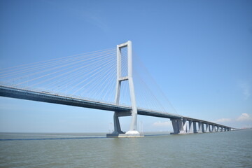 Suramadu Bridge which connects Java Island and Madura Island. This bridge is very famous.
