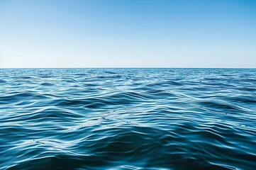 Fototapeta premium Calm Ocean Under Clear Blue Sky