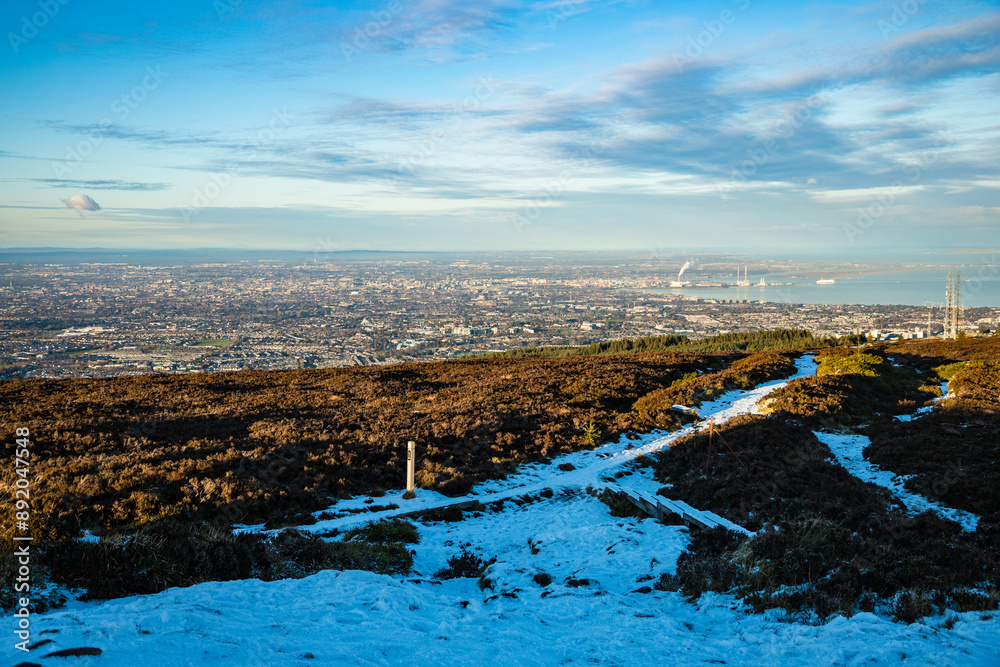 Wall mural dublin, ireland - city and nature views from the top of a hill