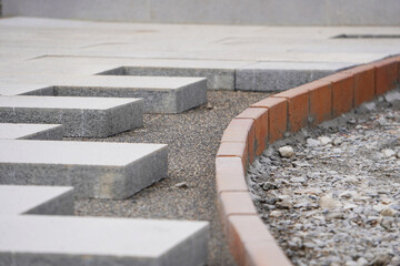 Brick Pathway Under Construction &ndash; Outdoor Landscaping Site（レンガでアプローチを作っている最中の外構工事の現場）