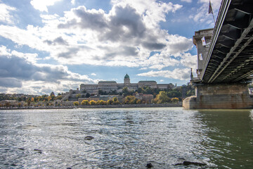 An incredible city view at sunrise or sunset. Extensive city panorama with historical buildings on...