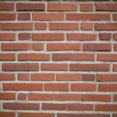 Fototapeta premium Orange brown red brick wall. Texture of old dark brown and red brick wall.