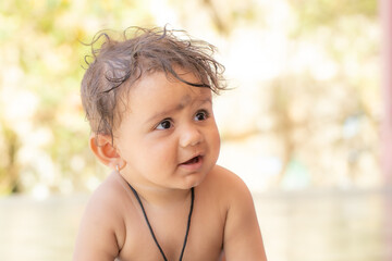 Curious Indian Baby with Wet Hair