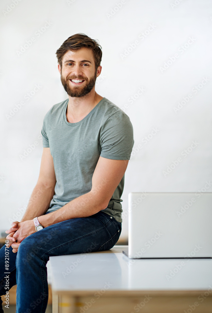 Aufkleber Laptop, portrait and smile with web development man on desk in office for creative website administration. Computer, design and internet with happy developer in workplace for online programming