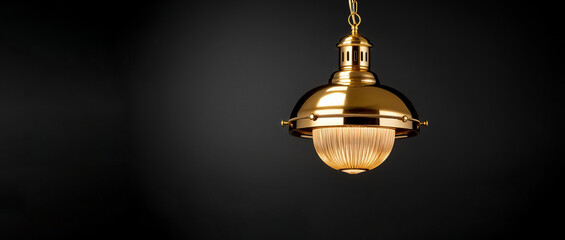 Naklejka premium Modern pendant light on a black background, Modern light hanging on black background, Hanging ceiling light, Decorative light