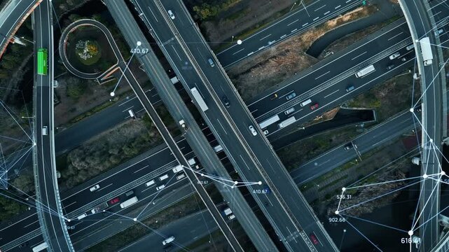 Composited image of drone aerial view of modern highway with cars running and communication network concept.