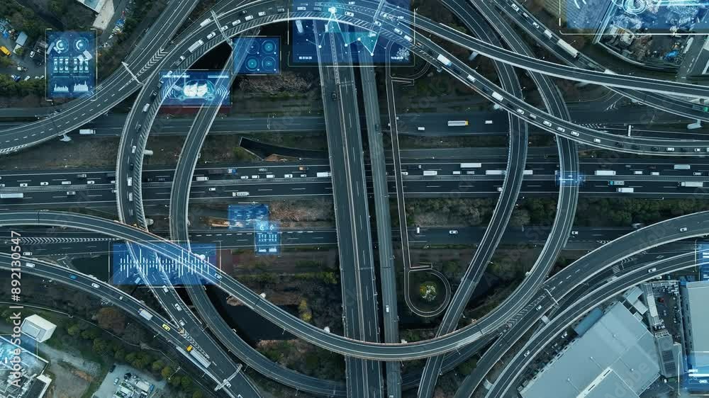 Aufkleber Composited image of drone aerial view of modern highway with cars running and digital technology concept.