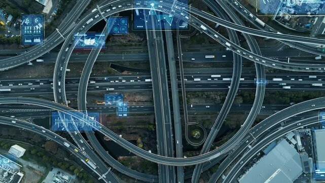 Composited image of drone aerial view of modern highway with cars running and digital technology concept.