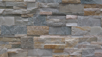 facade stone brown gray wall background of brick horizontal stone grey wallpaper