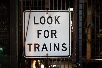 Obraz premium look for trains black and white sign warning old station