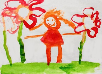 Child's drawing of a smiling girl standing between two large red flowers in a green meadow. 
