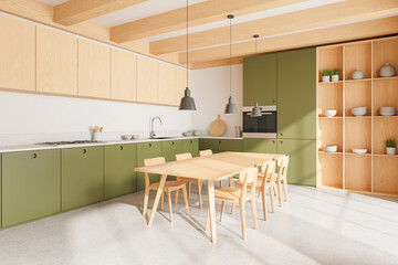 Green home kitchen interior with dining table, cooking cabinet and kitchenware