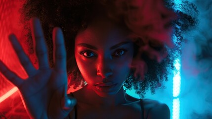 Mystical woman in neon light with hand gesture.