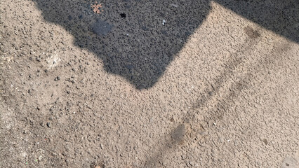 Street with shadows of houses