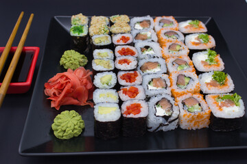 Sushi Feast on a Black Plate