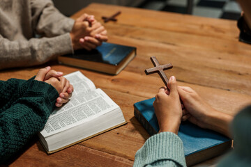 A person reads the Bible, embodying faith and spirituality. The scene reflects a serene moment of contemplation and devotion, highlighting the importance of religion in everyday life.