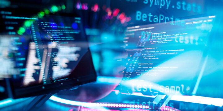 Program code on a computer monitor with fiber optic background. Internet and technology concept. Software application development
