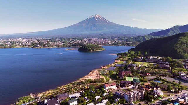 4K Drone footage of Mount Fuji, Kawaguchiko Lake and U island from Oishi Park on the northern bank of the lake before sunset, Japan
