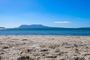 Crystal clear water sea ocean beach stop along the way to Freycinet national park, Tasmania, Australia 