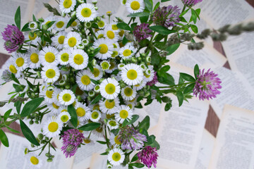 bouquet of flowers on a wooden background