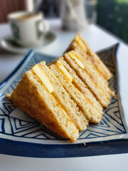 Kaya toasts butter and black coffee is a traditional oriental and vintage Kopitiam breakfast style. Popular in Malaysian and Singaporean