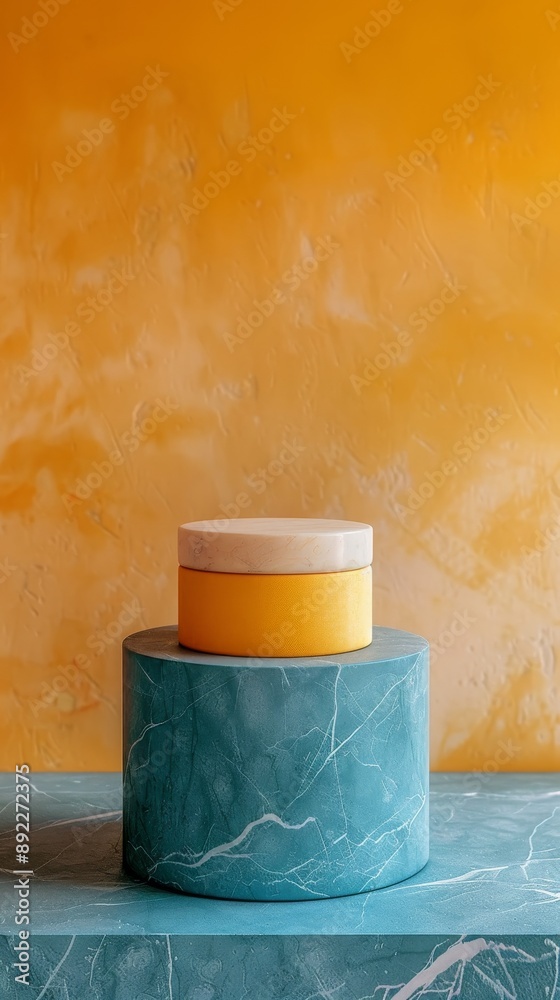 Wall mural A yellow and blue vase is on top of two marble pedestals