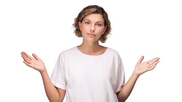 Woman Shrugging with Indifferent Expression Against White Background