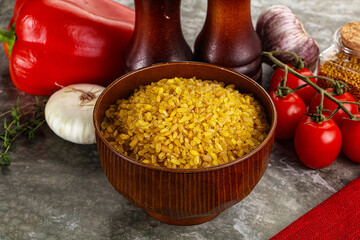 Dry wheat bulgur cereal heap