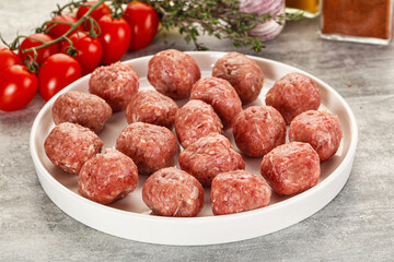 Uncooked raw beef meatball minced