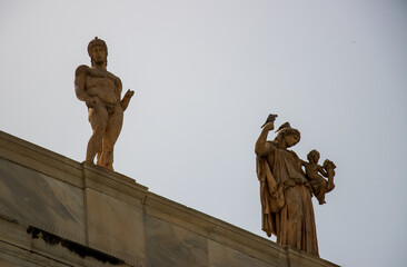 ancient greek statues on roof