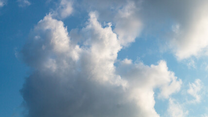 Different clouds in the sky at sunset