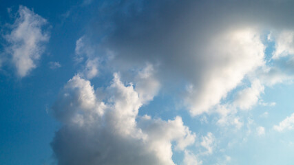Different clouds in the sky at sunset