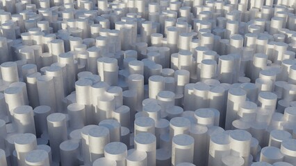 Abstract arrangement of white cylinders forming a textured surface.