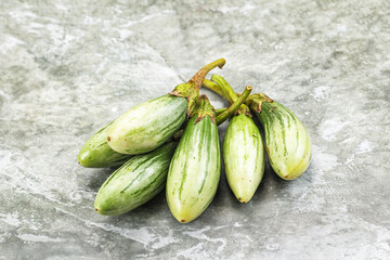 Small organic young green eggplant