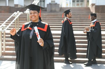 pretty african female college graduate at graduation