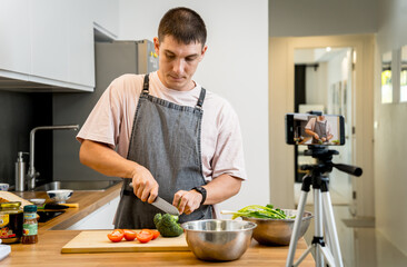 The chef is broadcasting live from workshop how to prepare a vegetarian food