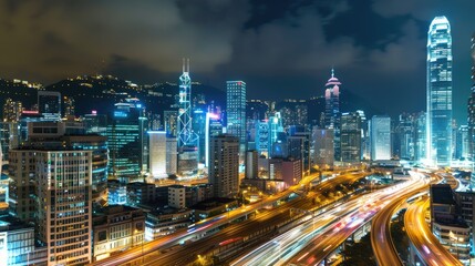 Fototapeta premium A city at night with a lot of lights and a freeway