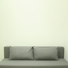 An empty wall above the couch for pictures or other home decorations. Lovely interior copy space for painting