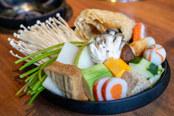 Enjoy authentic and delicious hot pot dishes with rich vegetables, tofu, meat slices, mushrooms and hot pot ingredients that are super nutritious and fresh