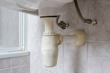 bottle trap under sink in bathroom