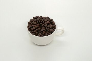 Espresso Americano in a ceramic fancy cup with fresh coffee bean scattered Isolated White Background