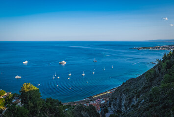 Beautiful panoramic landscape of Taormina, Italy. Sicilian seascape. Travel photography. June 2023