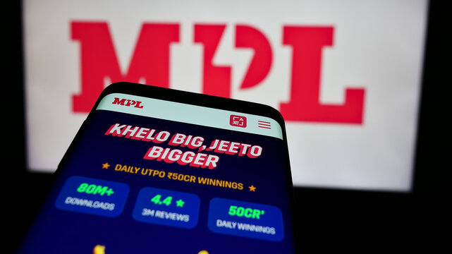 Stuttgart, Germany - 07-14-2024: Mobile phone with website of Indian online gaming company Mobile Premier League (MPL) in front of logo. Focus on top-left of phone display.